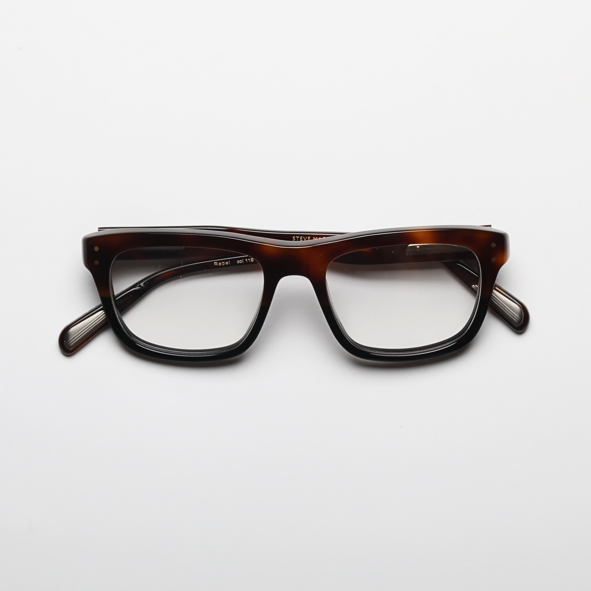 Steve McQueen Rebel — Tortoise To Black — official view 5